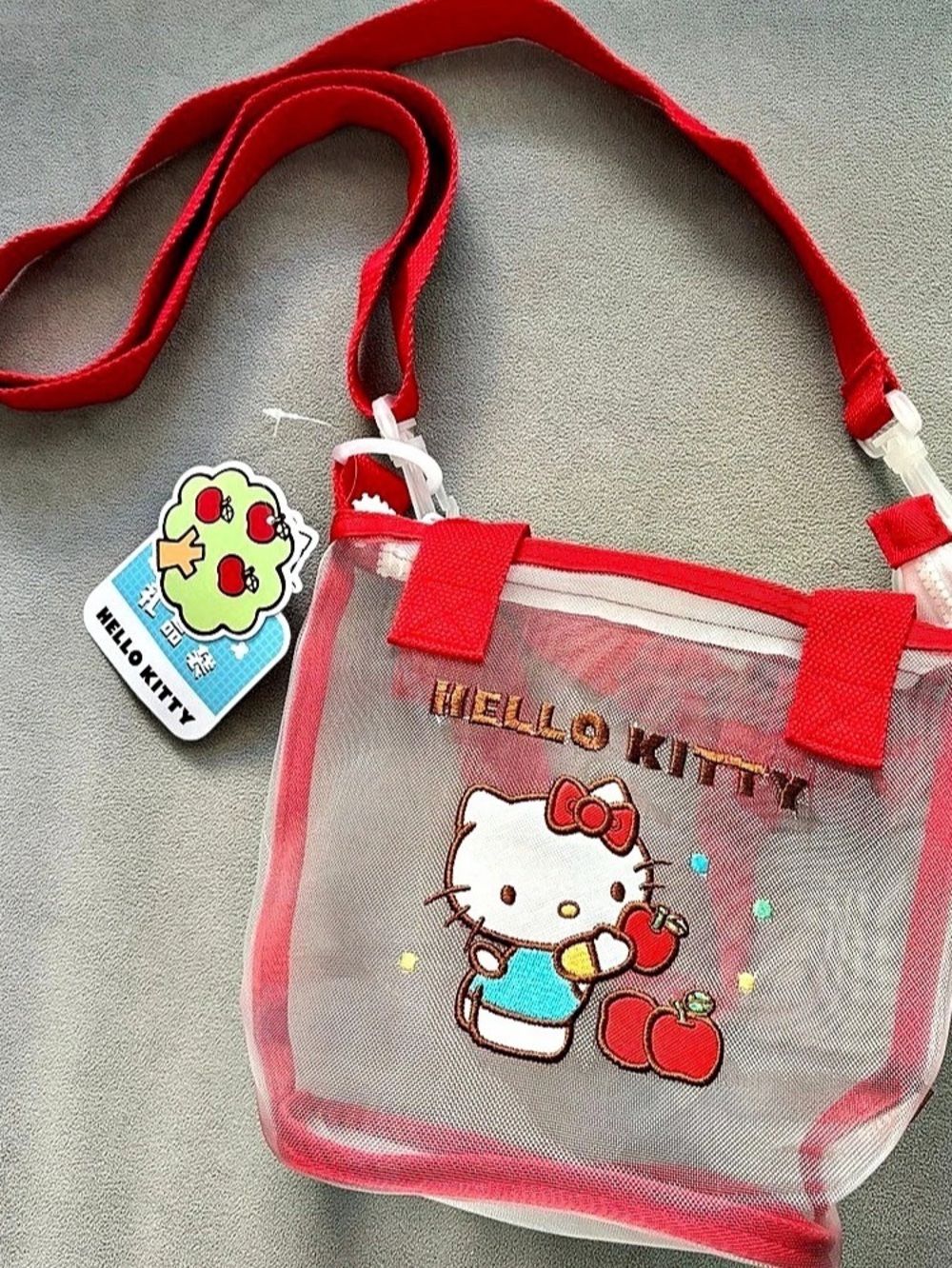 Hello Kitty Apple-themed mesh crossbody bag Red Mesh Crossbody Bag NWT